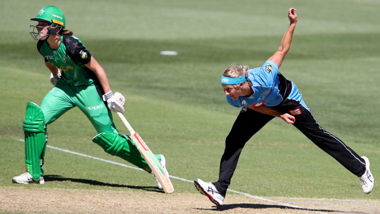 Match-winner: Sophie Devine in action with the ball for the Strikers at Adelaide Oval.