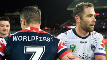 Brush off: Cooper Cronk and Cameron Smith after the Storm's win over the Roosters at Adelaide Oval last year.