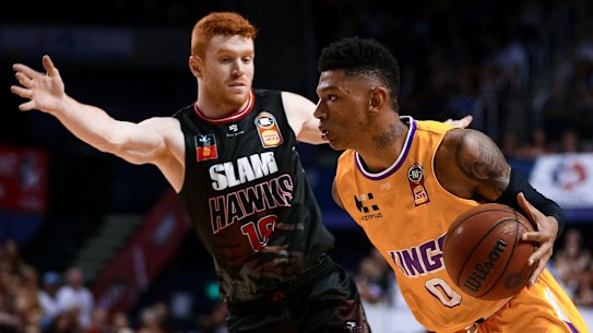 Didi Louzada of the Kings drives to the basket against Illawarra Hawks at WIN Entertainment Centre.