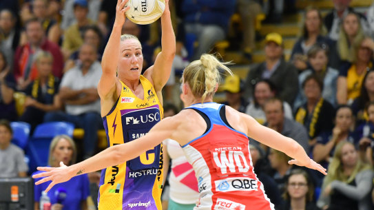 Lightning's Laura Langman (left) in action against the Swifts in last month's semi-final. 