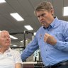 Professor Rob Newton (right) with patient Michael Pittaway (right) at the gym in the