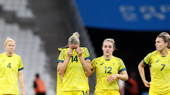 Gutted: The Matildas were holding on by a thread after a 2-1 defeat to the US in Marseilles.