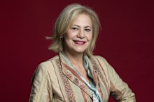 Rita Butera makes herself a smoothie for breakfast, which she drinks while she walks to the office.