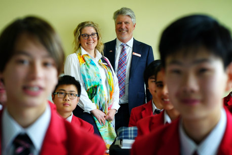 Auburn High School principal Ross Pritchard and assistant principal Kristie Satilmis with students. 