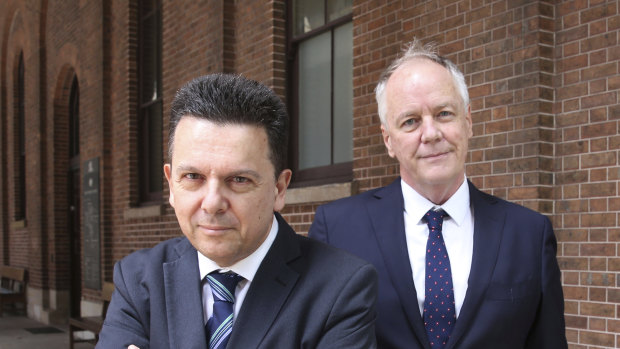 Former senator Nick Xenophon (left) and his former law firm partner Mark Davis.