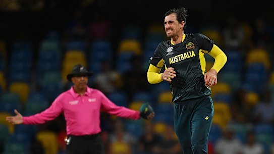 Mitchell Starc was forced to leave the field after favouring his left calf.