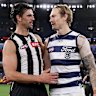 Scott Pendlebury of the Magpies and Tom Stewart of the Cats embrace after the final siren.