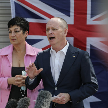 Campbell Newman, with wife Lisa, announces his Senate run with the Liberal Democrats. 