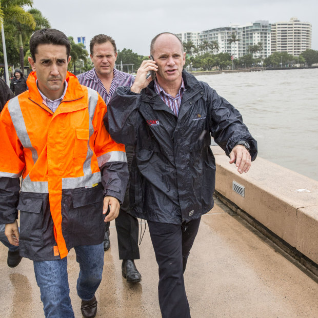 Current LNP Opposition Leader David Crisafulli (left) with Newman in Cairns as Cyclone Ita approaches in 2014.