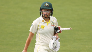 Healy walks off after her second duck of the Test. 