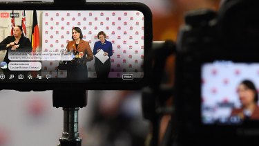 NSW Premier Gladys Berejiklian being streamed live during a COVID-19 briefing at Sydney Olympic Park on Wednesday.