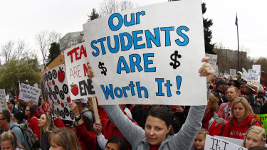 Teachers' pay has been linked to how well students perform. 
