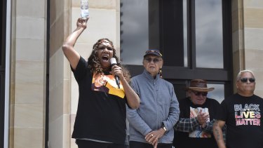 JCâ€™s sister Bernadette Clark addresses the crowd.