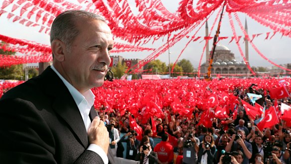 Turkey's President Recep Tayyip Erdogan gestures as he addresses supporters in Kayseri, Turkey, on Saturday.