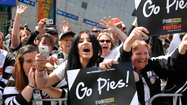 Collingwood fans at the grand final parade in 2011