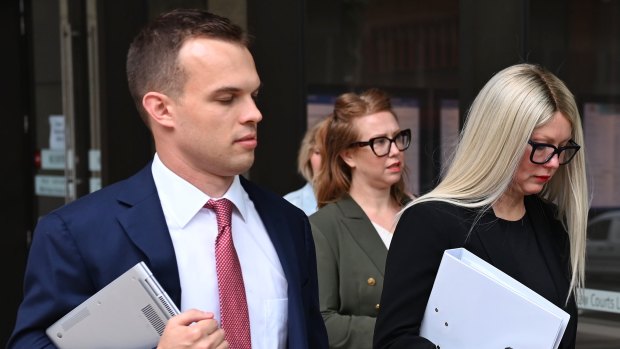 Elaine Stead, followed by her sister Olivia, outside the Federal Court in Sydney on Wednesday.