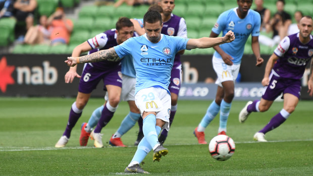 On target: City striker Jamie Maclaren scored from the penalty spot for his second goal of the game.