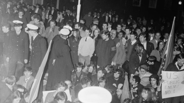 Protesters gather outside the US consulate on Commercial Road, Prahran