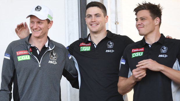 Forward Will Hoskin-Elliott (left) and key half-back Jack Crisp (centre) have extended their contracts to 2022 and 2023 respectively.