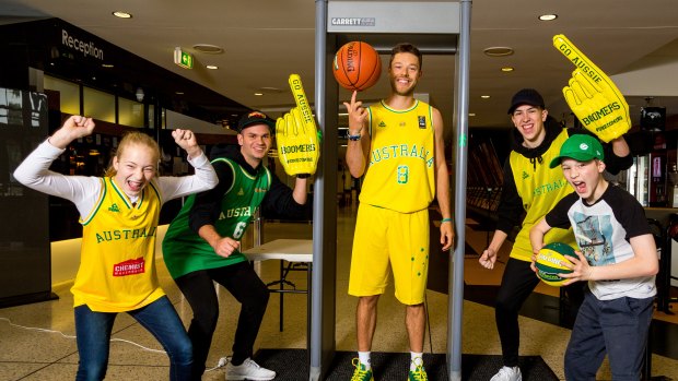 Setting a screen: Australian Boomers’ Matthew Dellavedova demonstrates the airport-style security arrangements that will be used for the two-game series against USA Basketball at Marvel Stadium in Melbourne.