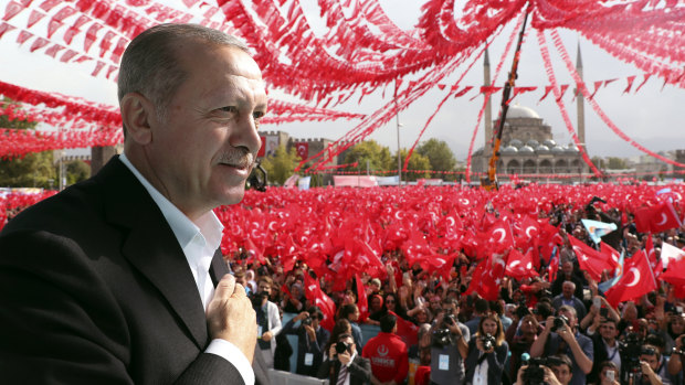 Turkey's President Recep Tayyip Erdogan gestures as he addresses supporters in Kayseri, Turkey, on Saturday.