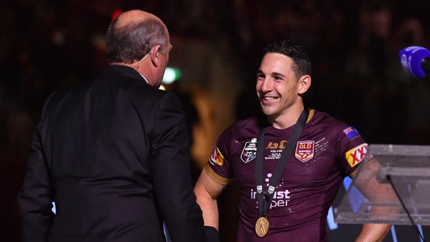 Controversial choice: Wally Lewis presents Billy Slater with the player of the series medal in 2018.
