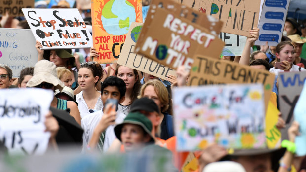 School students join a "climate change strike" in Brisbane earlier this year.