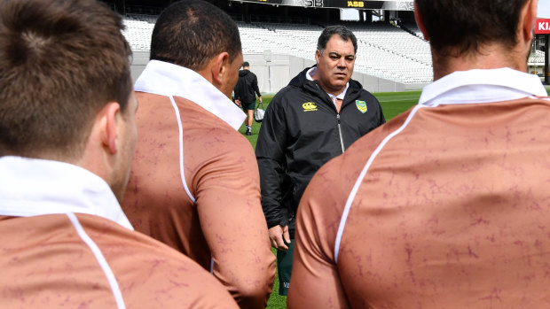 'I think our game acknowledges history extremely well': Mal Meninga addresses the Kangaroos dressed in commemorative brown.