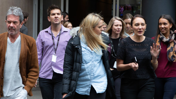 ABC staff walk out in protest over chairman Justin Milne's attempt to sack journalist Emma Alberici.