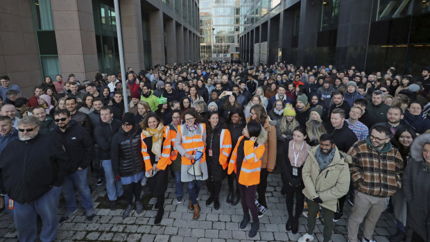 Employees gather outside Google's European headquarters in Dublin.