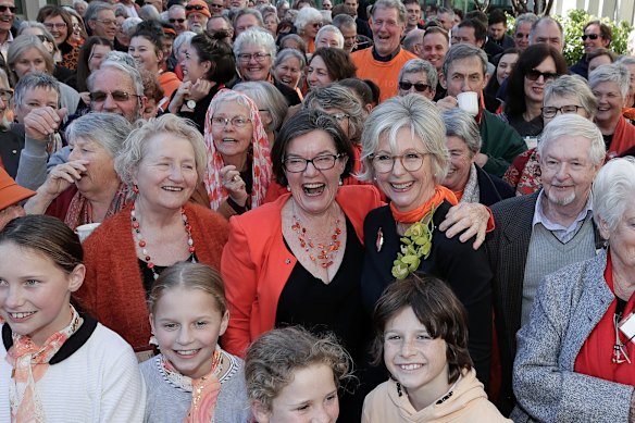 Independent MP Helen Haines poses in 2019 for a group photo with former MP for Indi Cathy McGowan and supporters.