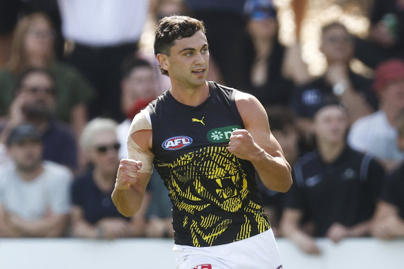 Tim Taranto celebrates kicking a goal in Friday’s match simulation against North Melbourne.