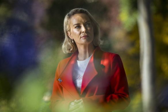 Farah Mak, a survivor advocate who works with women to rebuild self-worth, spoke at the Treasury Gardens vigil for family violence on Family Violence Remembrance Day on Wednesday.