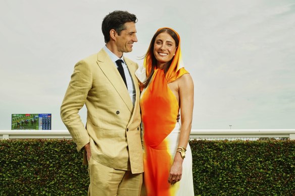 Television presenter Andy Lee in P Johnson and Rebecca Harding in Ferragamo.