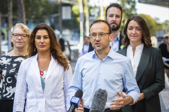 Australian Greens leader Adam Bandt, senators Lidia Thorpe and Janet Rice, and lower house candidates Steph Hodgins-May (Macnamara), Sonya Semmens (Higgins), Piers Mitchem (Kooyong) and Celeste Liddle (Cooper) front media at Federation Square.