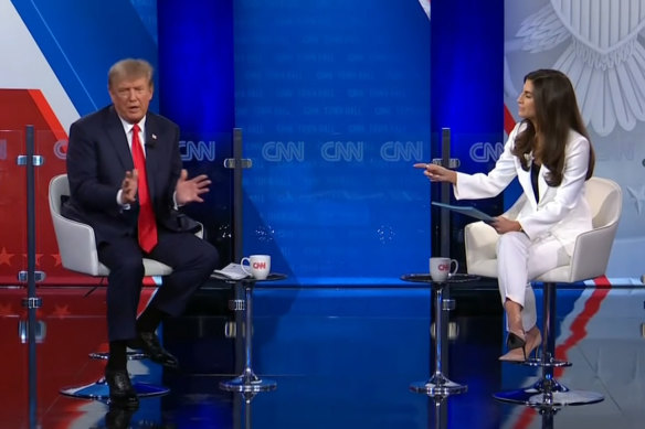  Kaitlan Collins and former US president Donald Trump at the CNN Town Hall.