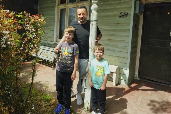 Vendor Steve Christopolous with sons Sam (left) and Liam.
