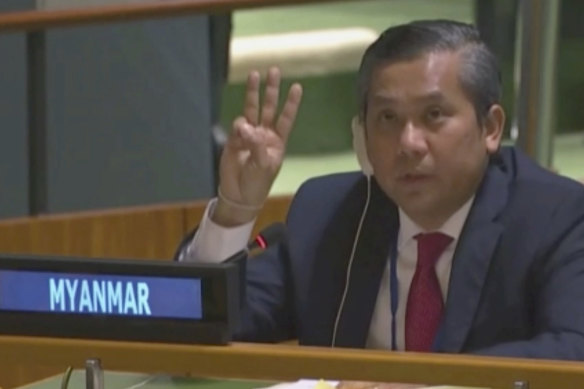Myanmar Ambassador to the United Nations Kyaw Moe Tun flashes the three-fingered, a gesture of defiance used by protesters in Myanmar, at the end of his speech to the UN General Assembly on Friday.