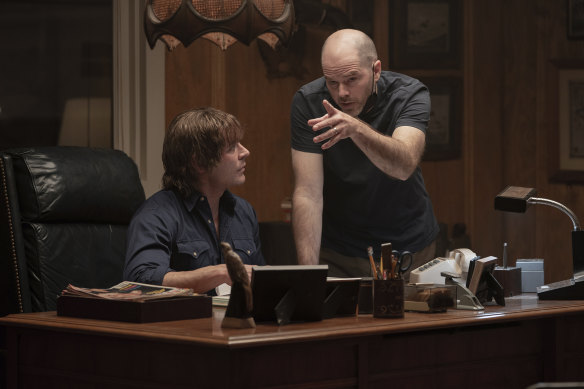 Director Sean Durkin (right) on the set of The Iron Claw with Zac Efron.