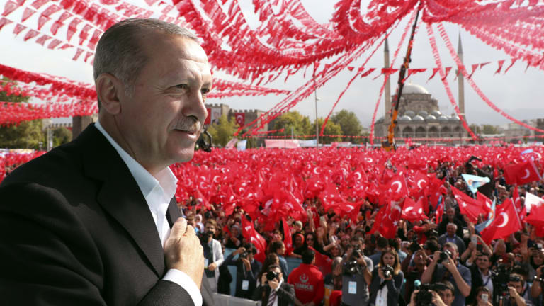 Turkey's President Recep Tayyip Erdogan gestures as he addresses supporters in Kayseri, Turkey, on Saturday.