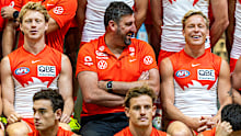 Coach Dean Cox and Isaac Heeney with members of the Sydney Swans AFL team in January 2026.