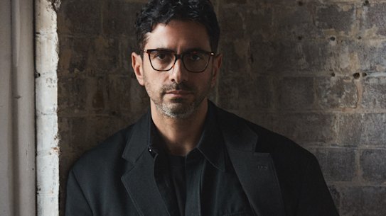 Christopher Esber has made a signature of wearing black, but says he has a passion for orange and purple garments, too.