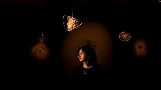 Curator Denise Mimmocchi at the Margel Hinder exhibition at the Art Gallery of NSW.