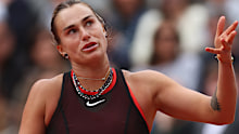 Aryna Sabalenka reacts against Diana Shnaider during their French Open quarter final.