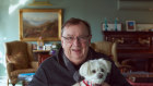 This photo of Harold Mitchell in his Melbourne apartment in 2020 taken by the AFR featured heavily in Monday’s service.