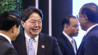 Japan’s Foreign Minister Yoshimasa Hayashi, centre, talks with Malaysian Foreign Minister Zambry Abdul Kadir, right, and Laotian Foreign Minister Saleumxay Kommasith during the ASEAN Post Ministerial Conference with Japan in Jakarta in July.