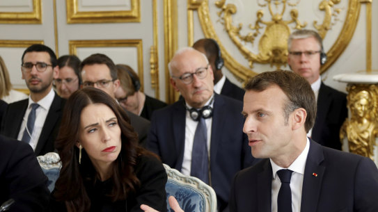 French President Emmanuel Macron and New Zealand's Prime Minister Jacinda Ardern attend a meeting at the Elysee Palace.