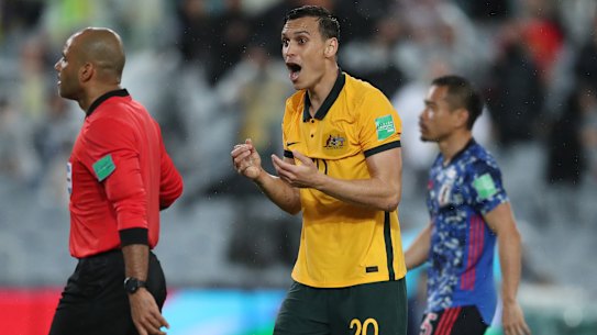 Socceroo Trent Sainsbury remonstrates with referee Nawaf Abdullah Shukrallah during Australia’s loss to Japan in Sydney