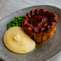 Pie, creamy mash and peas are the $22 special at The Woolwich.