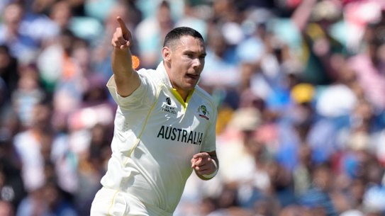 Scott Boland celebrates the wicket of Shubman Gill.